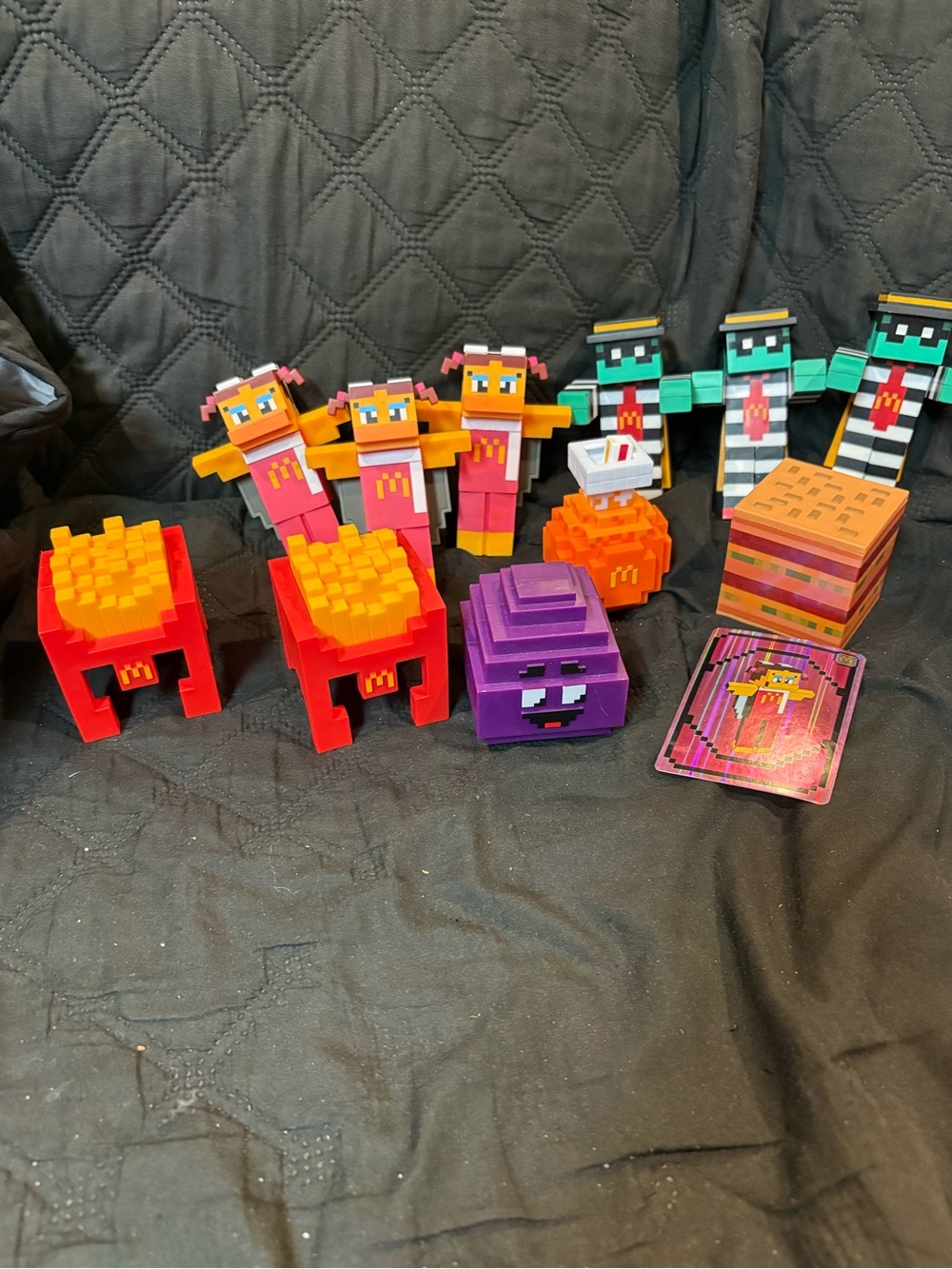 Colorful Block-Style Action Figure Set in Red, Orange, Purple, Green